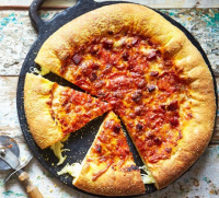 Mozzarella stuffed crust pizza recipe - BBC Good Food image