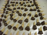 Chocolate Dipped Peanut Butter Bugles | Just A Pinch Recipes image