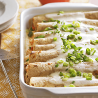 Seafood Enchiladas Recipe | EatingWell image