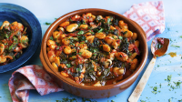 Gigantes with tomatoes and greens recipe - BBC Food image