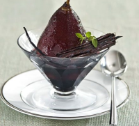 Poached pears in spiced red wine recipe - BBC Good Food image