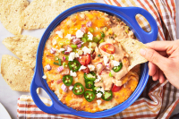 Best Refried Bean Dip Recipe - How To Make ... - Delish image