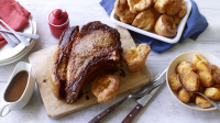 Roast rib of beef with roast potatoes recipe - BBC Food image