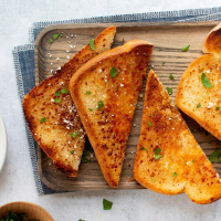 Quick Garlic Toast Recipe: How to Make It - Taste of Home image