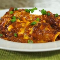 Cheesy Chili Enchiladas Recipe | Allrecipes image