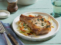 Sage Rubbed Pork Chops with Warm Apple Slaw - Food Netw… image