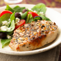 Mediterranean Pork Chops Recipe | EatingWell image