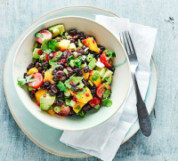 Guacamole & mango salad with black beans - BBC Good Food image
