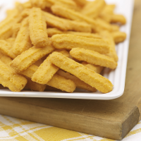 Cheddar Cheese Straws Recipe | MyRecipes image
