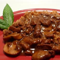Beef Tips and Merlot Gravy with Beef and Onion Rice Recipe ... image