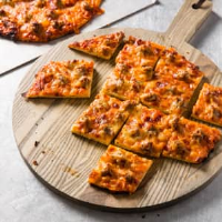 Chicago Thin-Crust Pizza - Cook's Country image