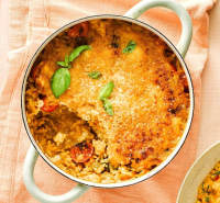 Baked tomato, mozzarella & basil risotto - BBC Good Food image