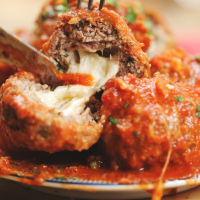 Easy Slow Cooker Mozzarella-Stuffed Meatballs And Sauce … image