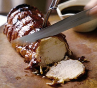 Guinness & honey glazed pork loin recipe - BBC Good Food image