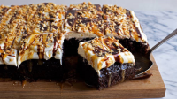 Chocolate-Caramel-Peanut Poke Cake Recipe - BettyCroc… image