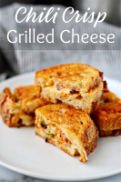 Chili Crisp Grilled Cheese with Homemade Crusty Cheese Bre… image