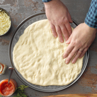 The Best Pizza Dough Recipe: How to Make It - Taste of Home image