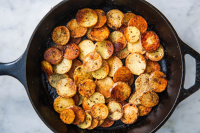 Best Pan Fried Potatoes Recipe - How to Pan Fry ... - Delish image