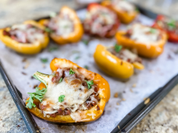 Stuffed red peppers recipe - BBC Good Food image