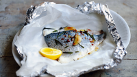 Baked sea bream with garlic and rosemary recipe - BBC Food image