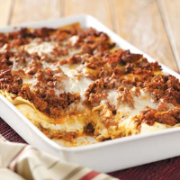 Six-Cheese Lasagna Recipe: How to Make It - Taste of Home image