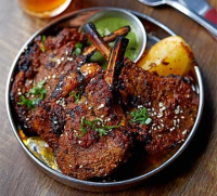 Moroccan-spiced lamb shoulder with onions and free… image