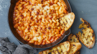 Cheesy White Bean-Tomato Bake Recipe - NYT Cooking image