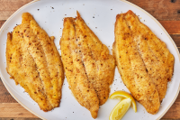 Best Baked Catfish Recipe - How to Make Baked Catfish - Delish image