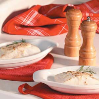 Halibut with Crab Sauce Recipe: How to Make It - Taste of Home image